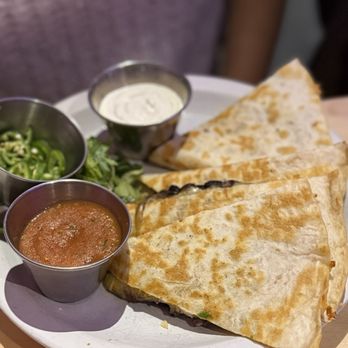 Centro signature dishes Carnitas en AdoboQuesadillaYuca Fries